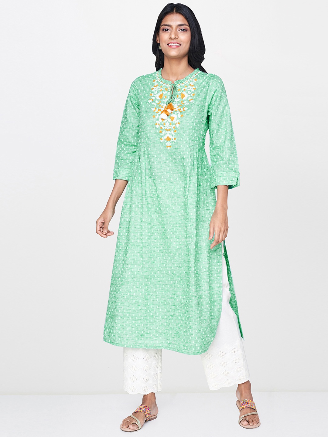 

Global Desi Women Green & White Woven Design A-Line Kurta With Embroidered Detailing
