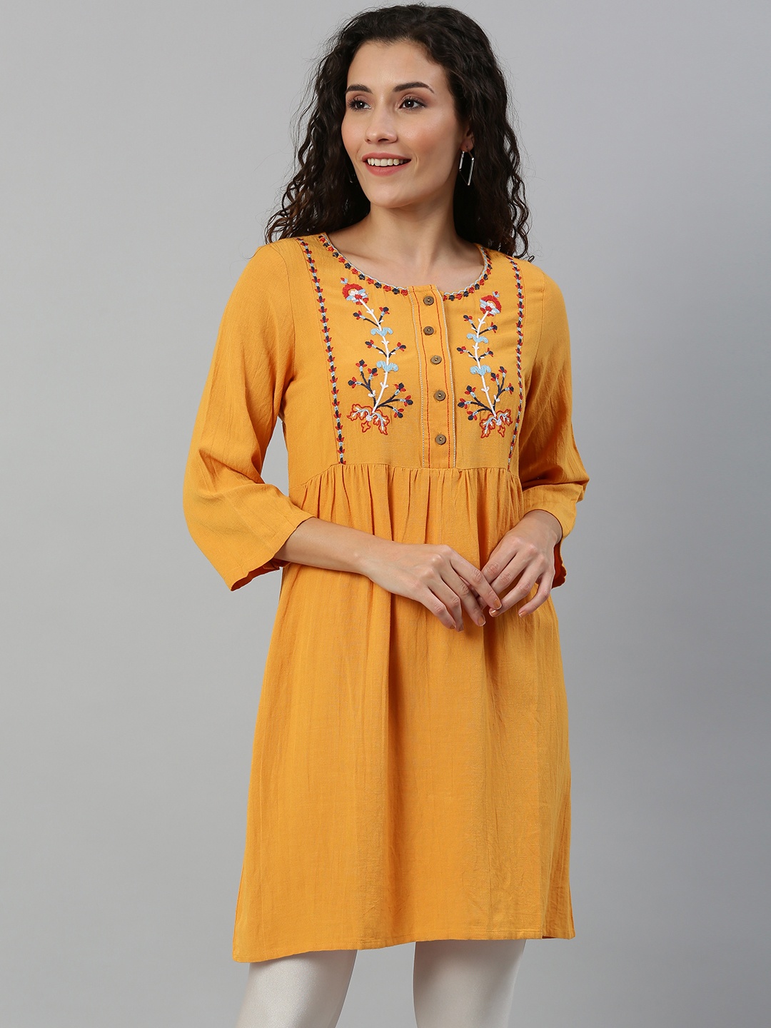 

Global Desi Women Mustard Yellow Embroidered Tunic