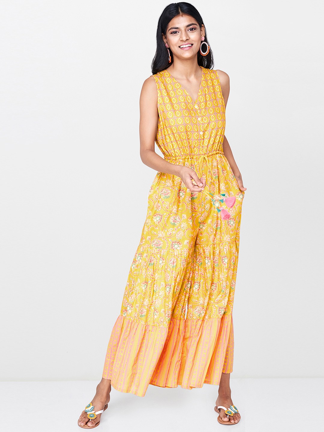 

Global Desi Women Mustard Yellow & Pink Printed Basic Jumpsuit