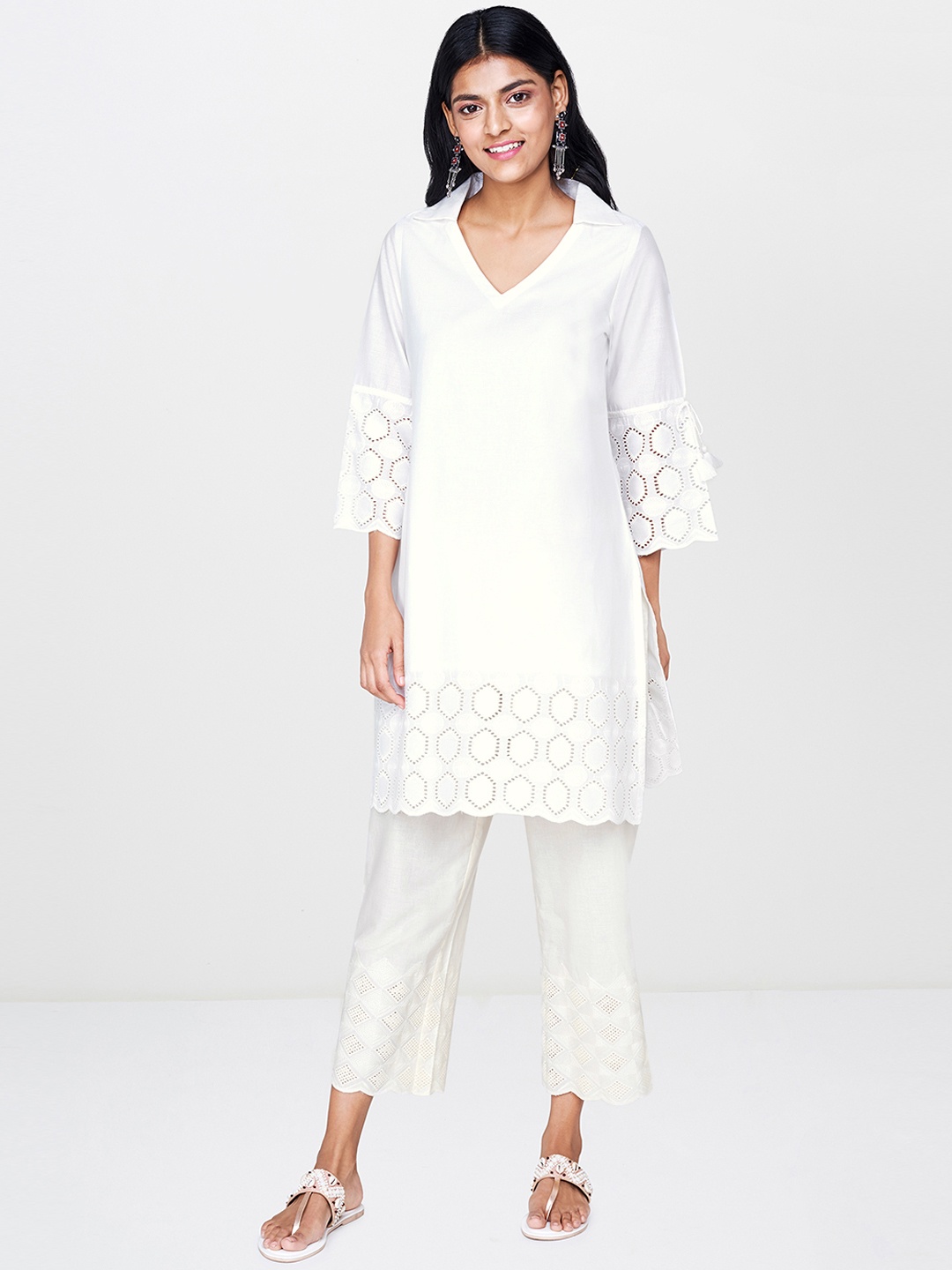 

Global Desi Women White Solid Straight Kurta With Embroidered Detailing