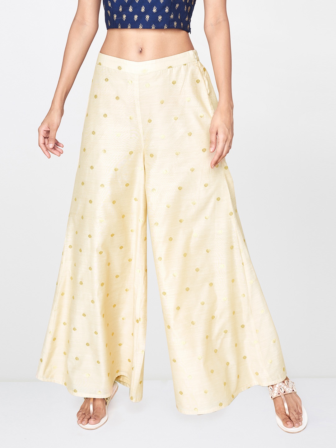 

Global Desi Women Beige & Gold-Toned Printed Wide Leg Palazzos