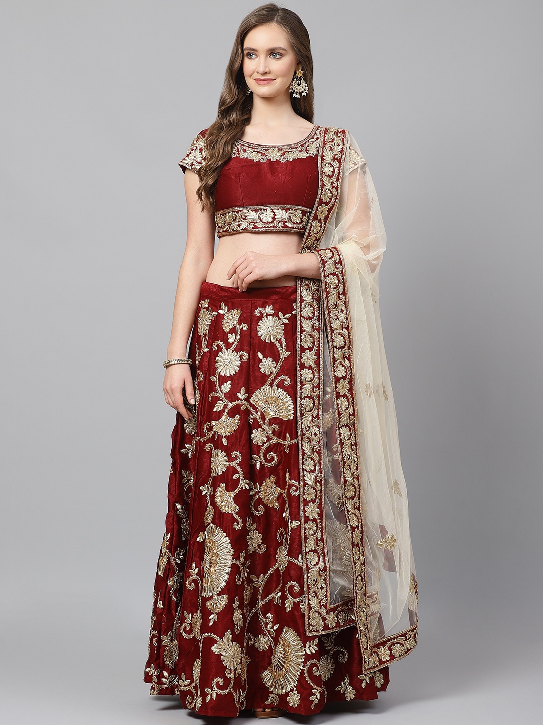 

Readiprint Fashions Maroon & Golden Zari Embroidered Semi-Stitched Lehenga & Choli