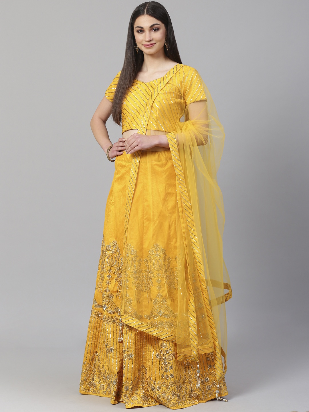 

Readiprint Fashions Yellow & Gold-Toned Embroidered Semi-Stitched Lehenga & Unstitched Blouse with Dupatta