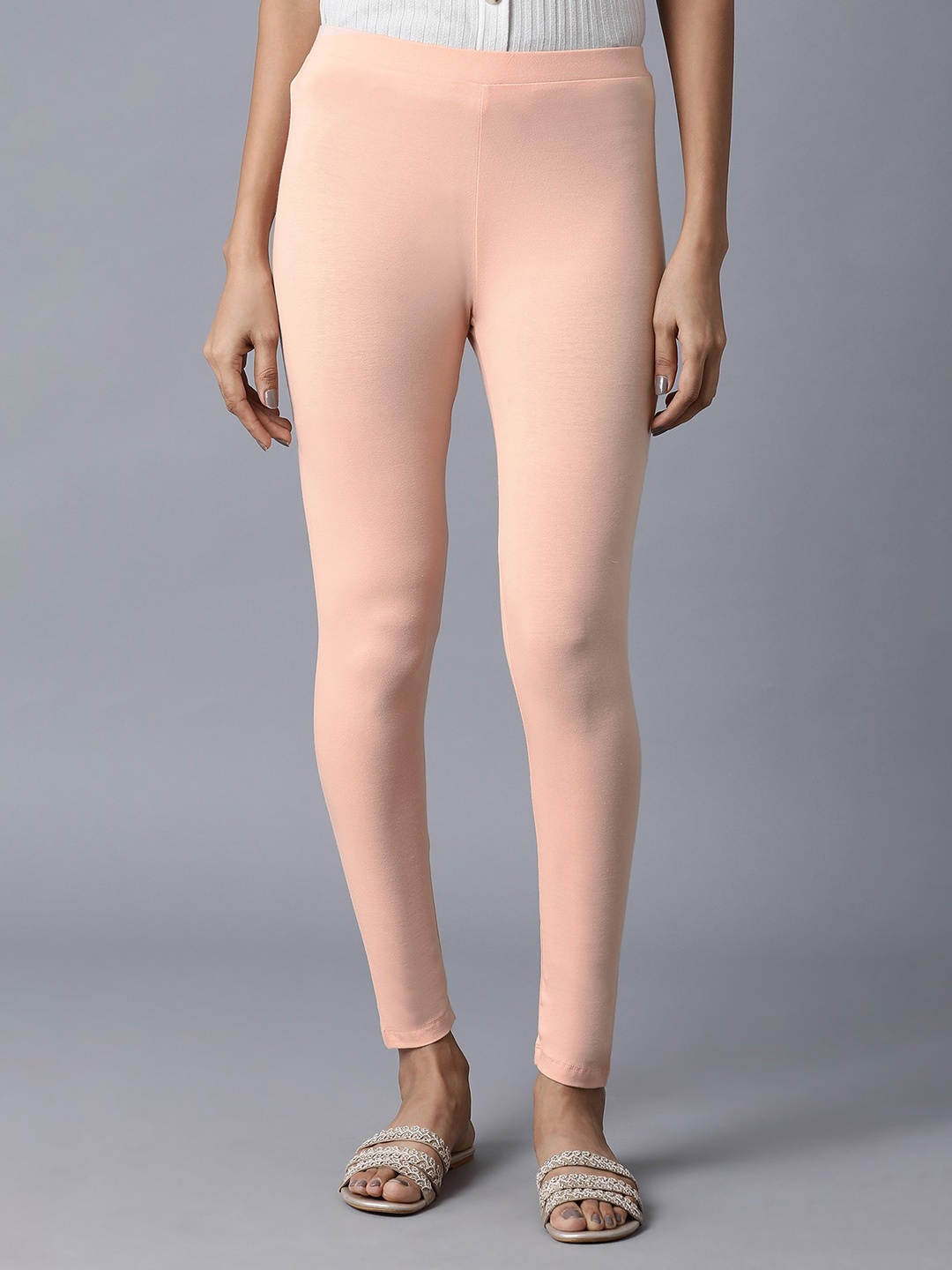 

W Women Peach-Coloured Solid Leggings