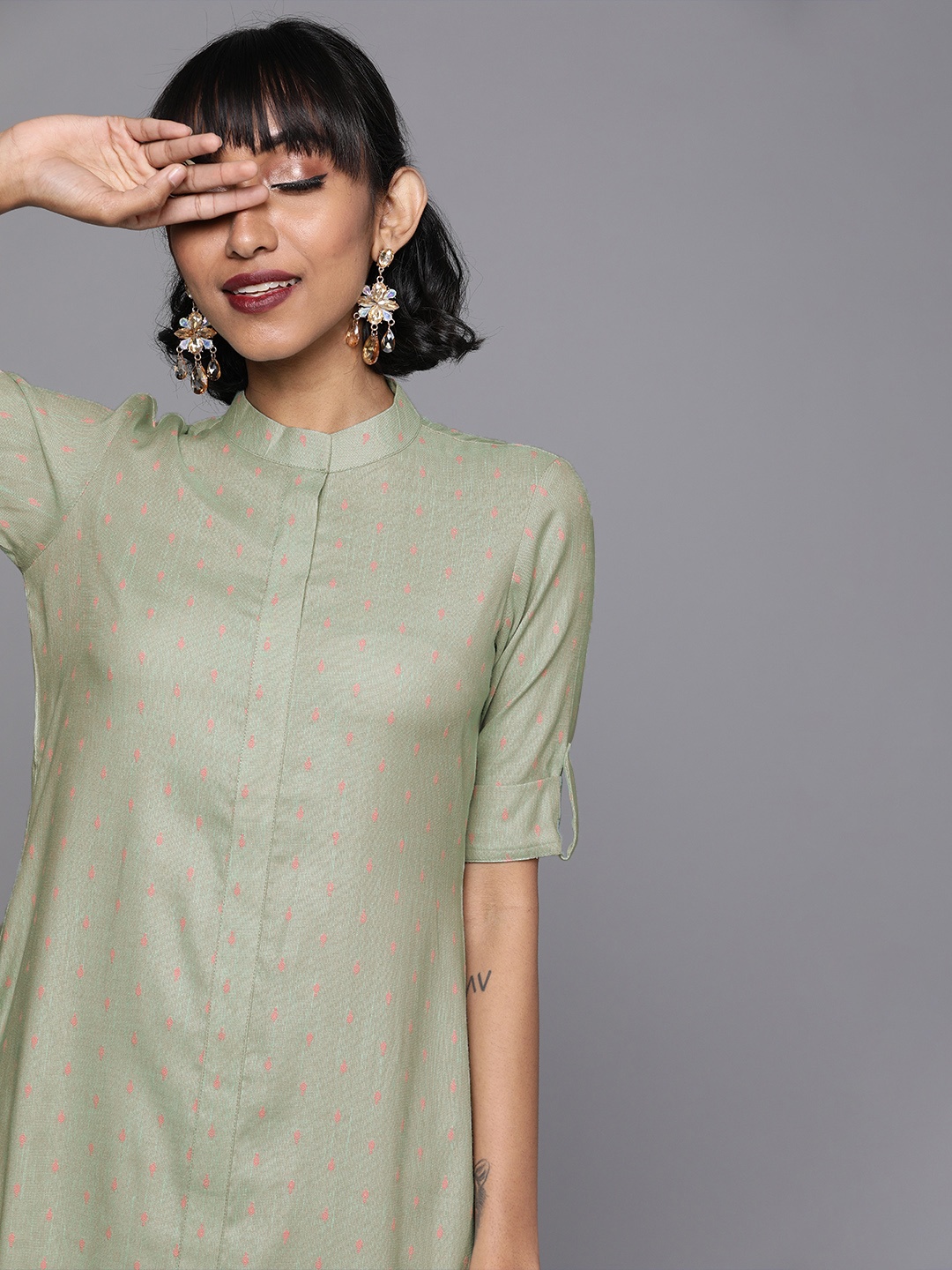 

Inddus Women Sea Green & Pink Woven Design Cotton Kurta with Trousers