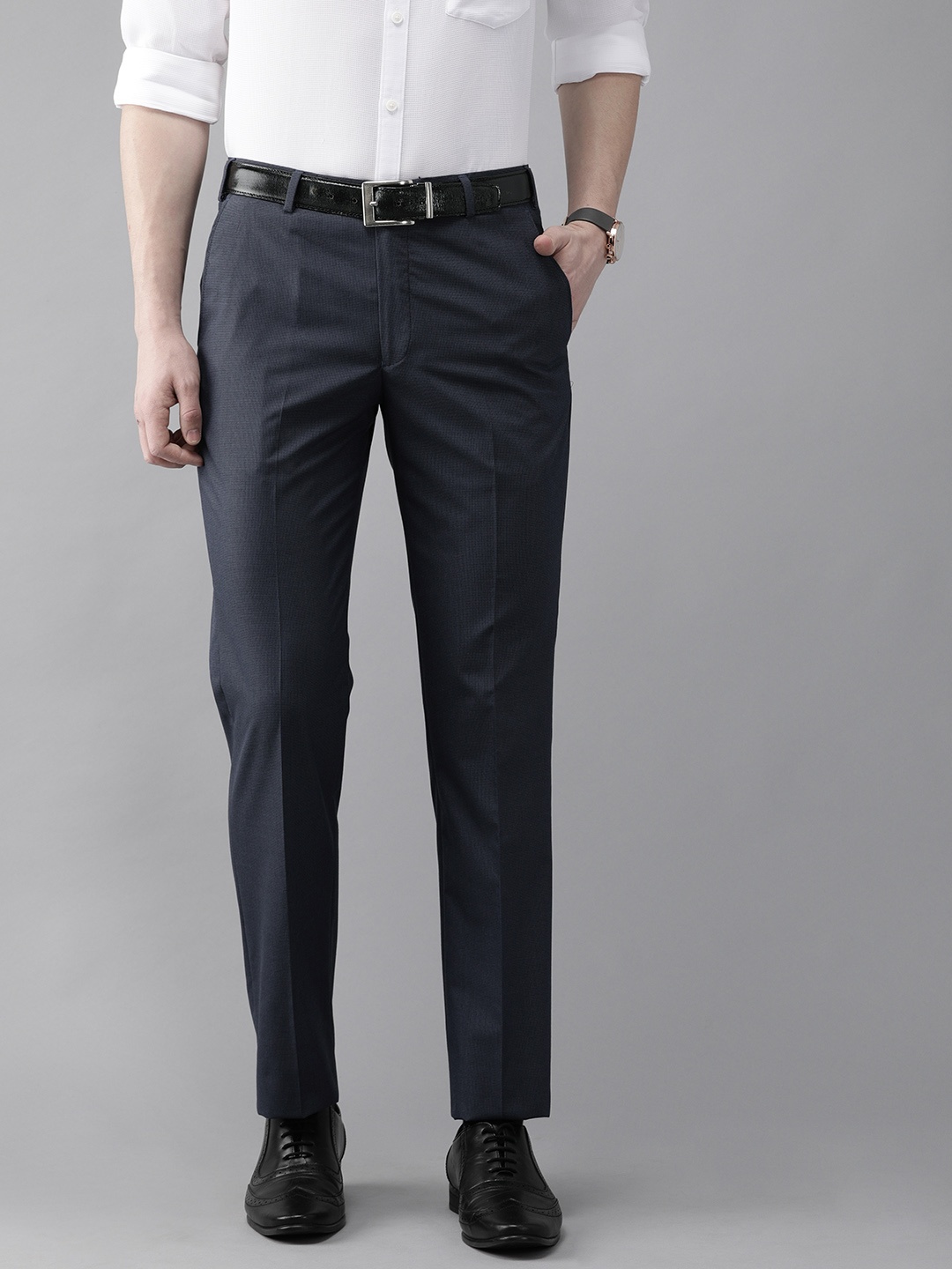 

Park Avenue Men Blue & Black Smart Fit Self Design Formal Trousers