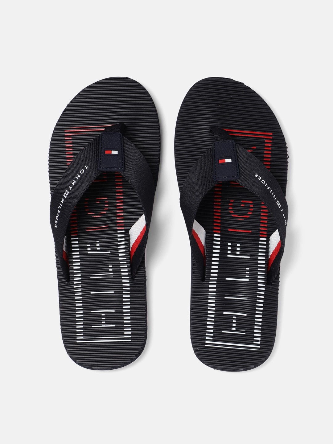 

Tommy Hilfiger Men Black Self Design Thong Flip-Flops