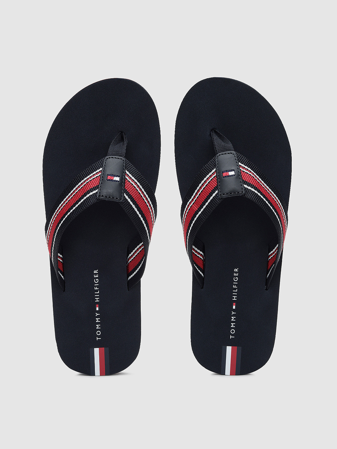 

Tommy Hilfiger Men Navy Blue Striped Thong Flip-Flops