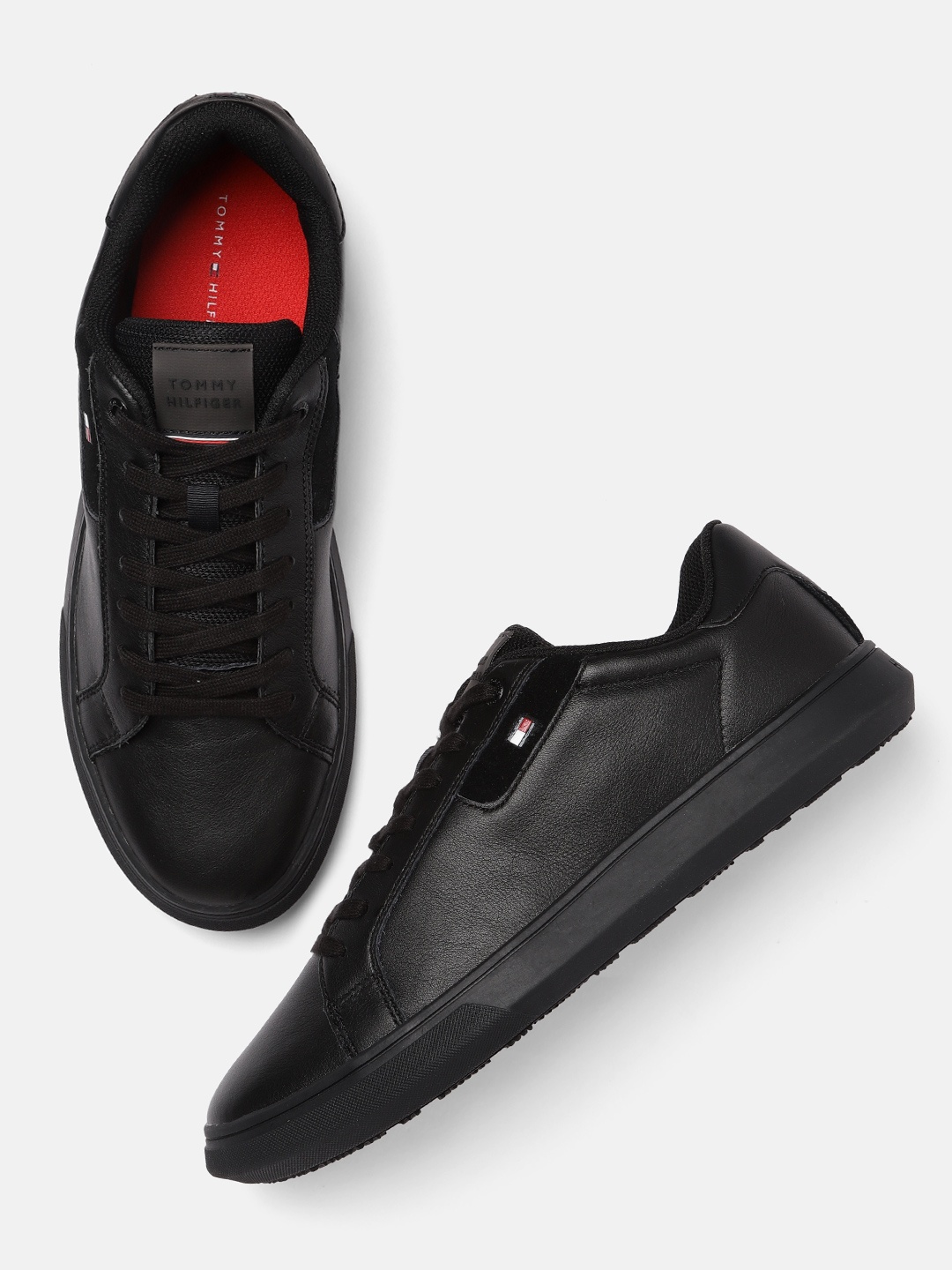 

Tommy Hilfiger Men Black Solid Sneakers
