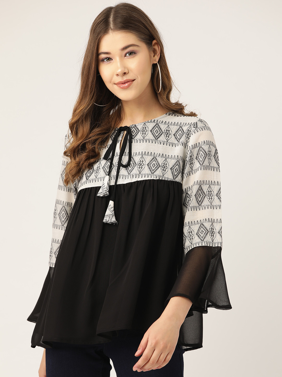

Antheaa Women Black & Off-White Printed A-Line Top