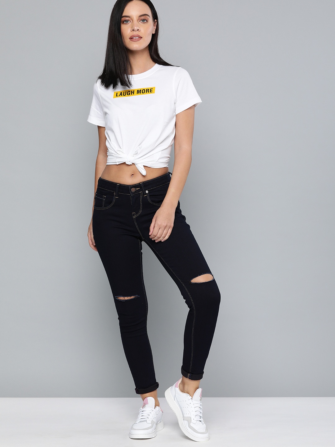 

HERE&NOW Women Navy Blue Skinny Fit Mid-Rise Slash Knee Stretchable Ankle Length Jeans