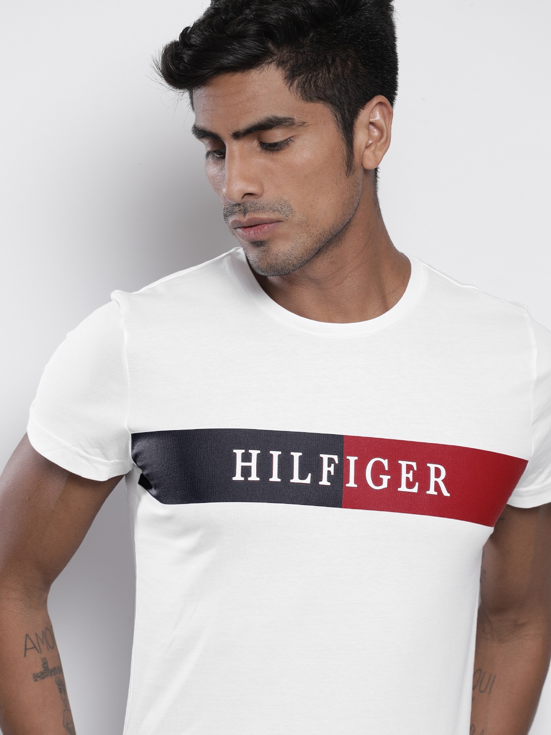 

Tommy Hilfiger Men White Printed Round Neck Pure Cotton T-shirt