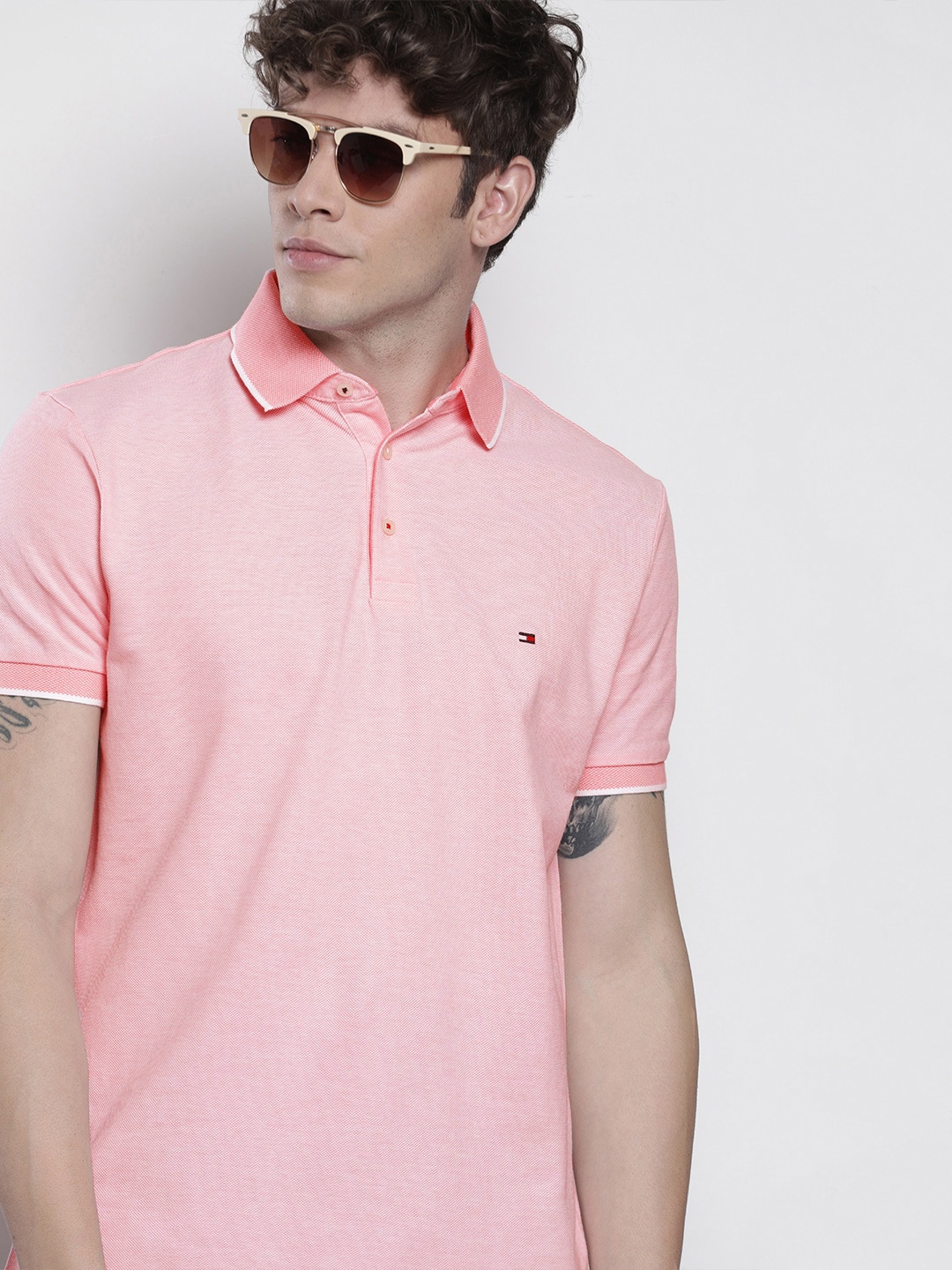 

Tommy Hilfiger Men Pink Solid Polo Collar T-shirt