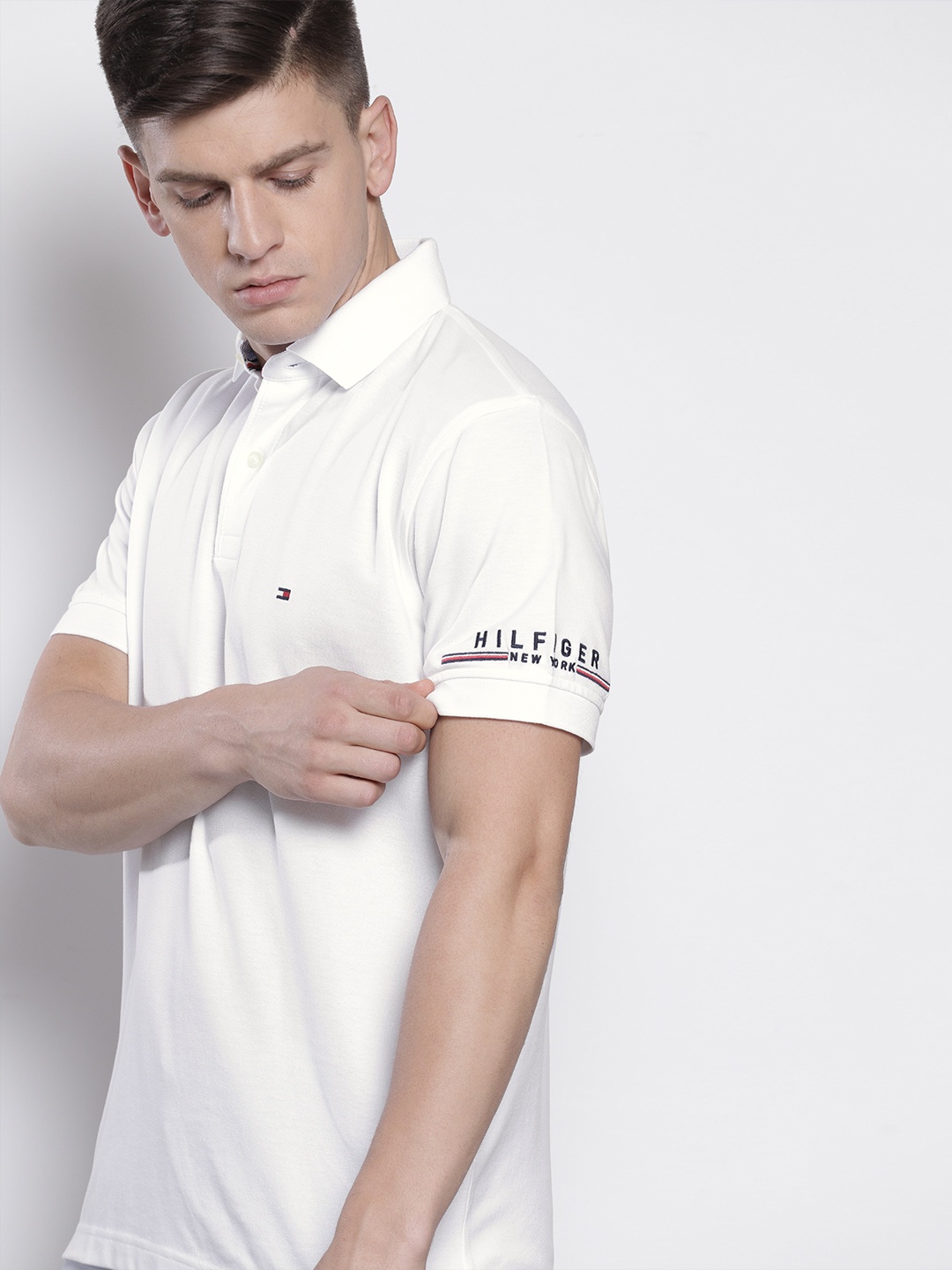 

Tommy Hilfiger Men White Solid Polo Collar Pure Cotton T-shirt