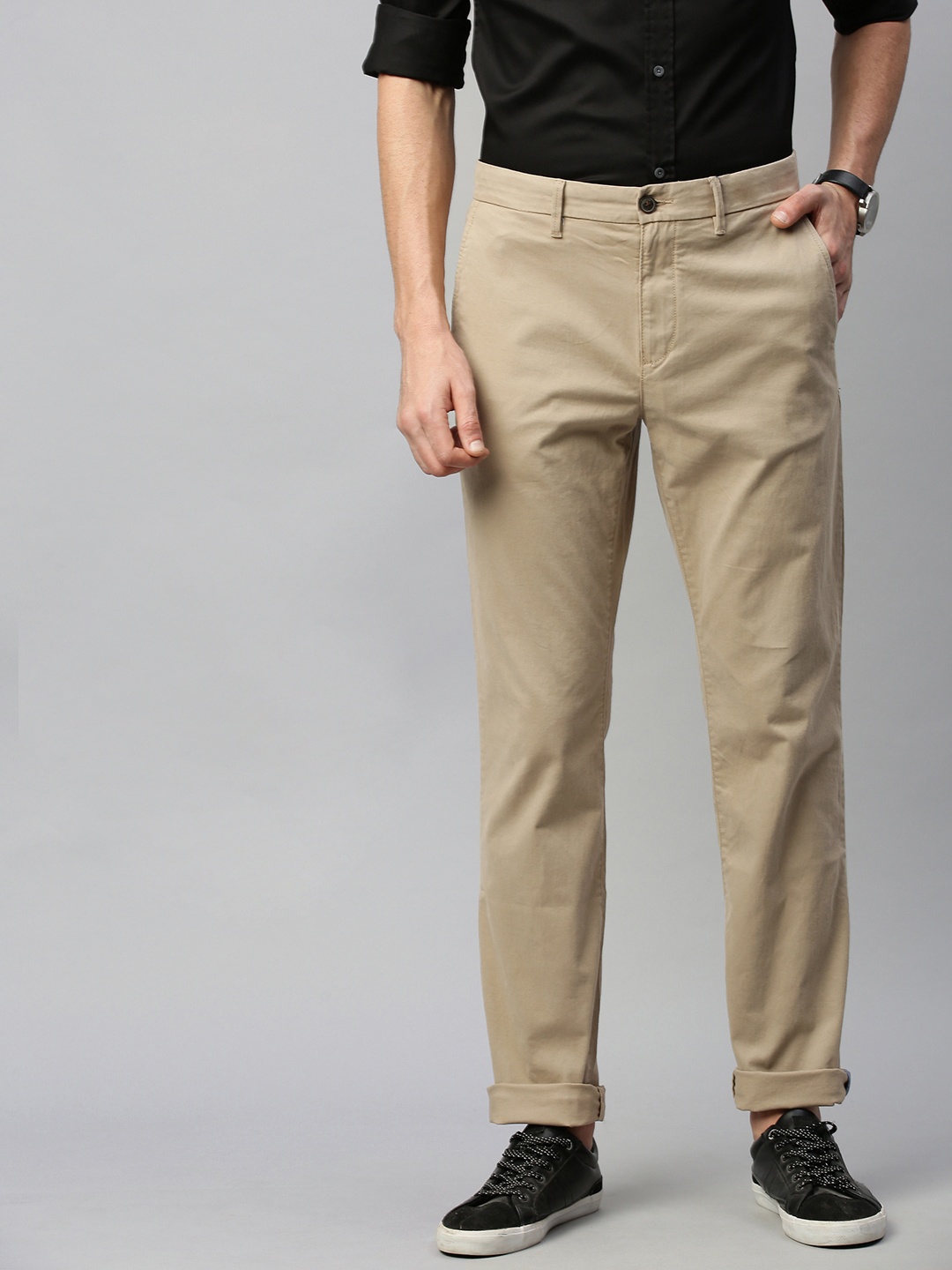

Tommy Hilfiger Men Beige Regular Fit Solid Chinos