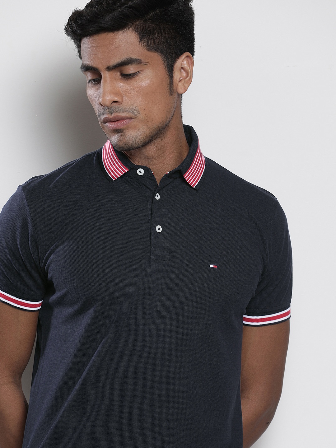 

Tommy Hilfiger Men Navy Blue Regular Fit Solid Polo Collar Pure Cotton T-shirt