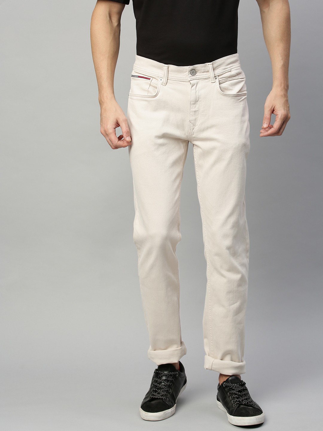 

Tommy Hilfiger Men Cream-Coloured Slim Fit Mid-Rise Clean Look Stretchable Jeans