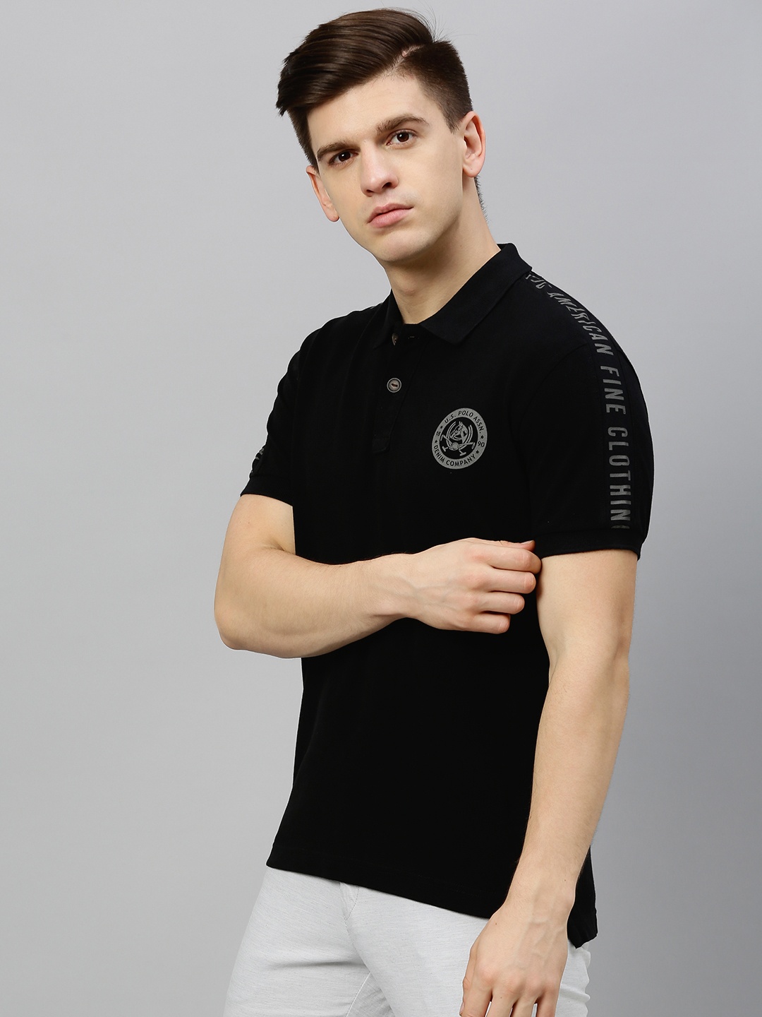 

U.S. Polo Assn. Denim Co. Men Black Solid Polo Collar Pure Cotton T-shirt with Print Detail