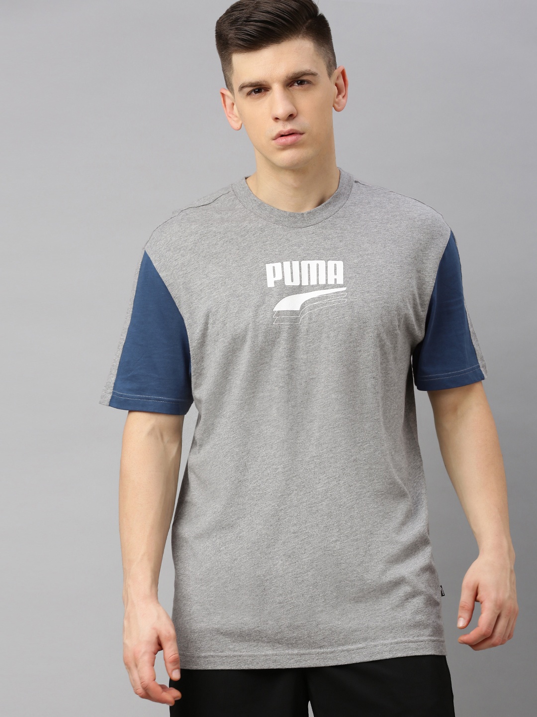 

Puma Men Grey Solid Round Neck T-shirt With Brand Logo Print