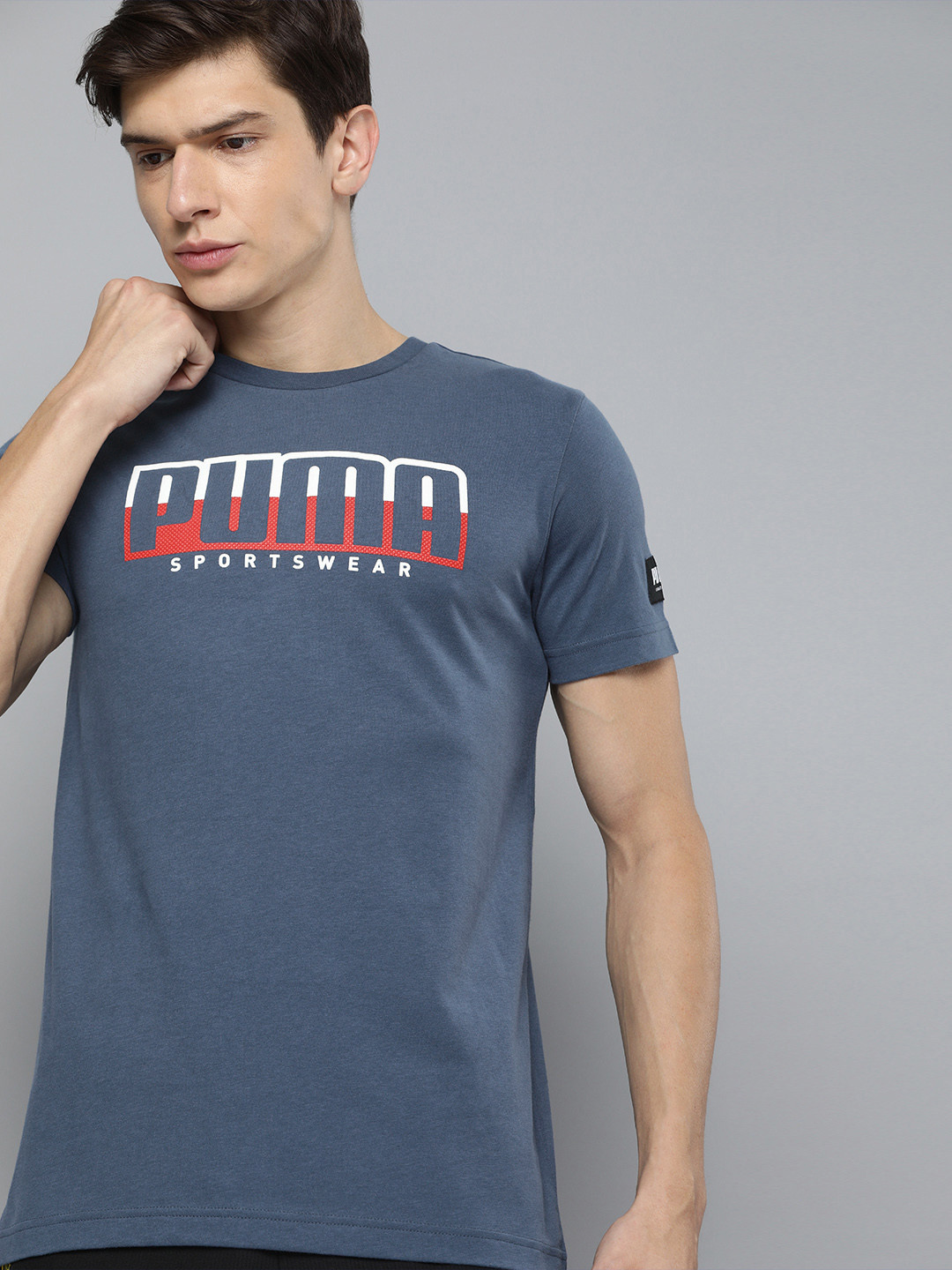 

Puma Men Blue Slim Fit Solid Round Neck Pure Cotton T-shirt with Printed Detailing