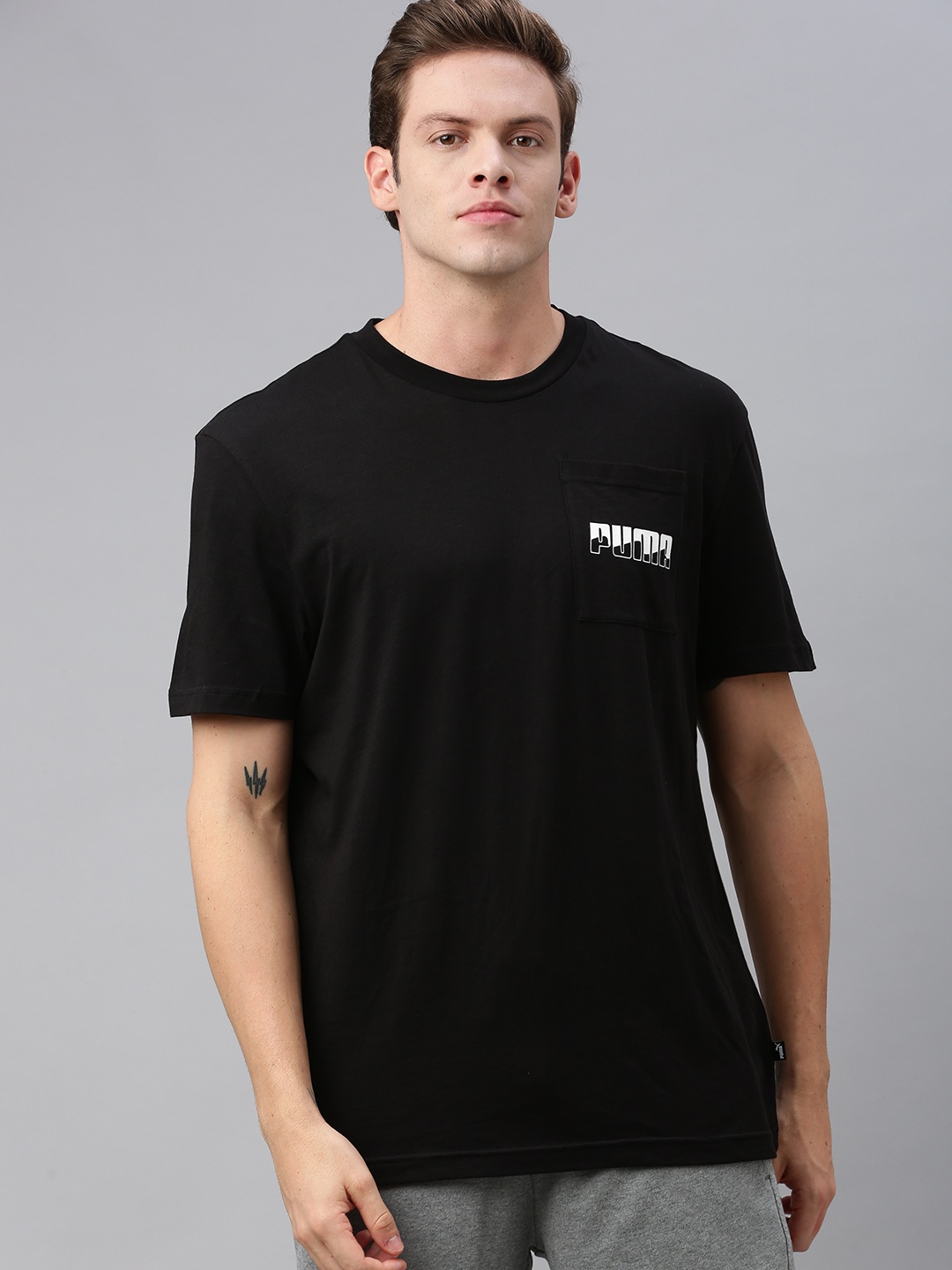 

Puma Men Black Relaxed Fit Solid Rebel Round Neck Pure Cotton T-shirt