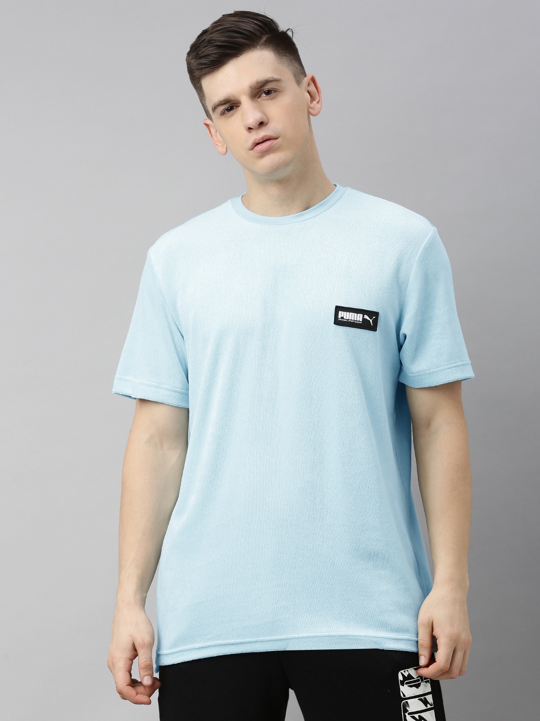 

Puma Men Blue Fusion Relaxed Fit Solid Round Neck T-shirt with Applique