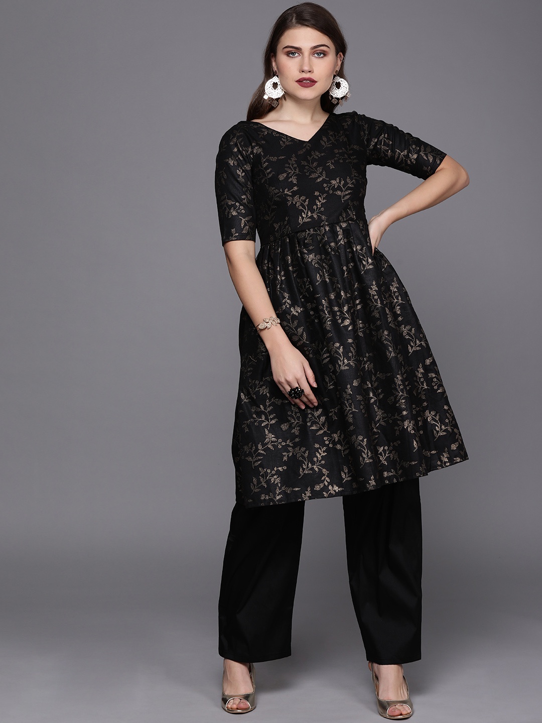 

Ethnovog Women Black Gold-Coloured Made to Measure Printed Kurta with Palazzos
