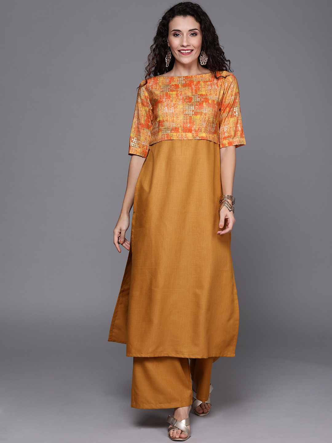 

Ethnovog Women Mustard Yellow Orange Made to Measure Printed Kurta with Palazzos