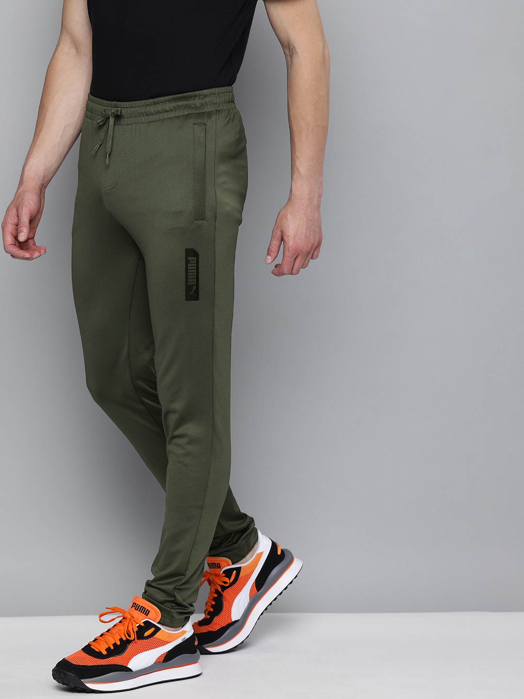

Puma Men Green Solid Elevated Slim Fit Track Pants