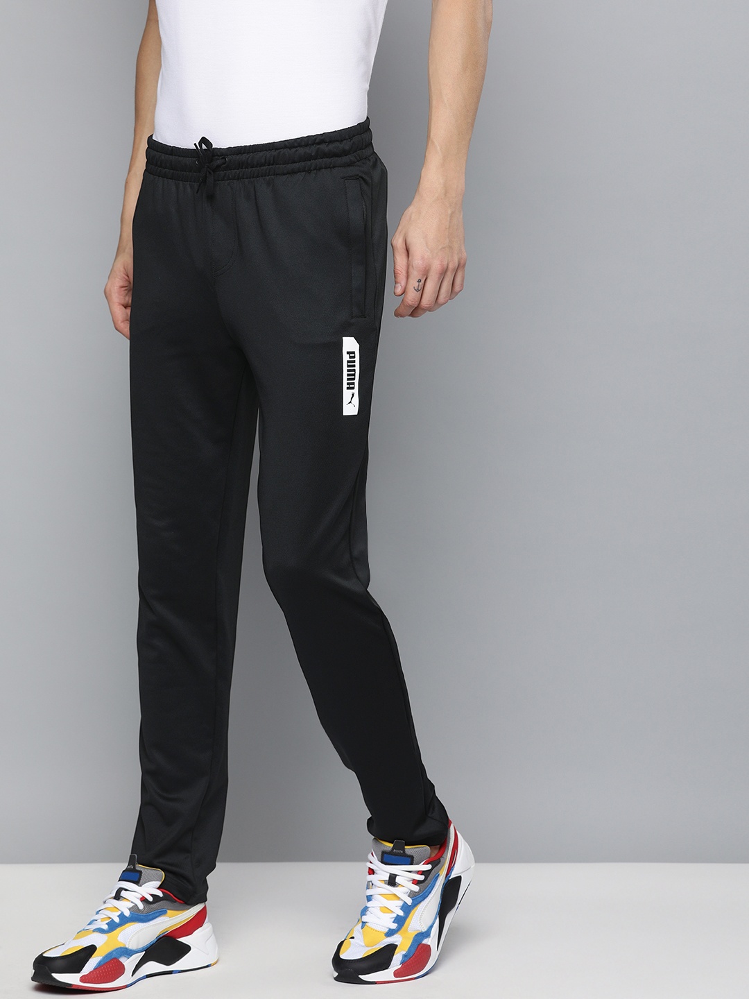 

Puma Men Black Solid Elevated Slim Fit Track Pants