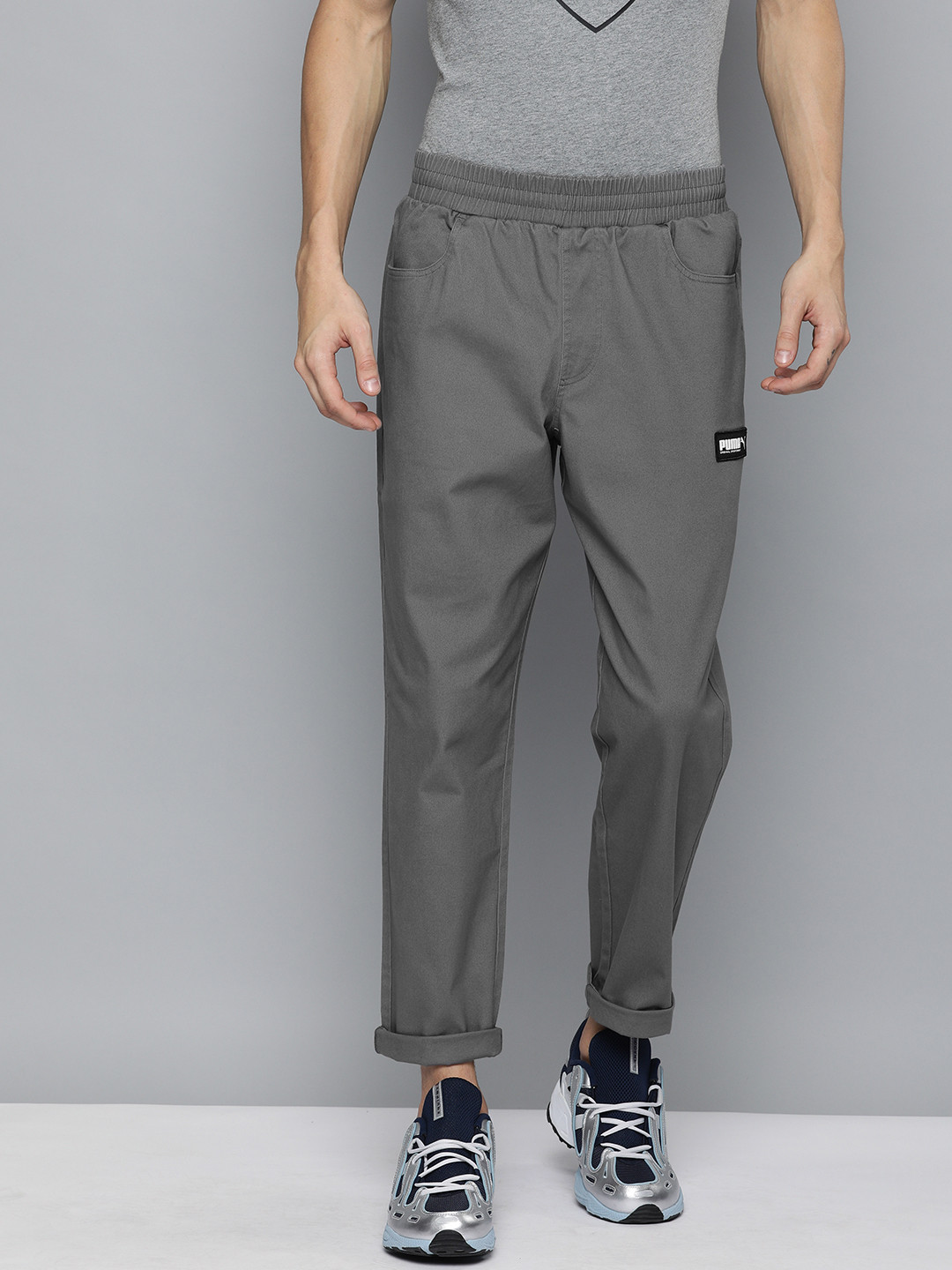 

Puma Men Grey Straight Fit Solid Regular Trousers
