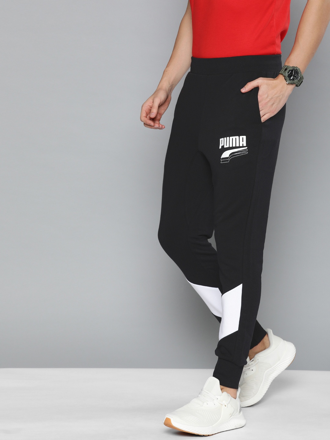 

Puma Men Black Solid Straight Fit REBEL Block cl TR Joggers With printed Detail