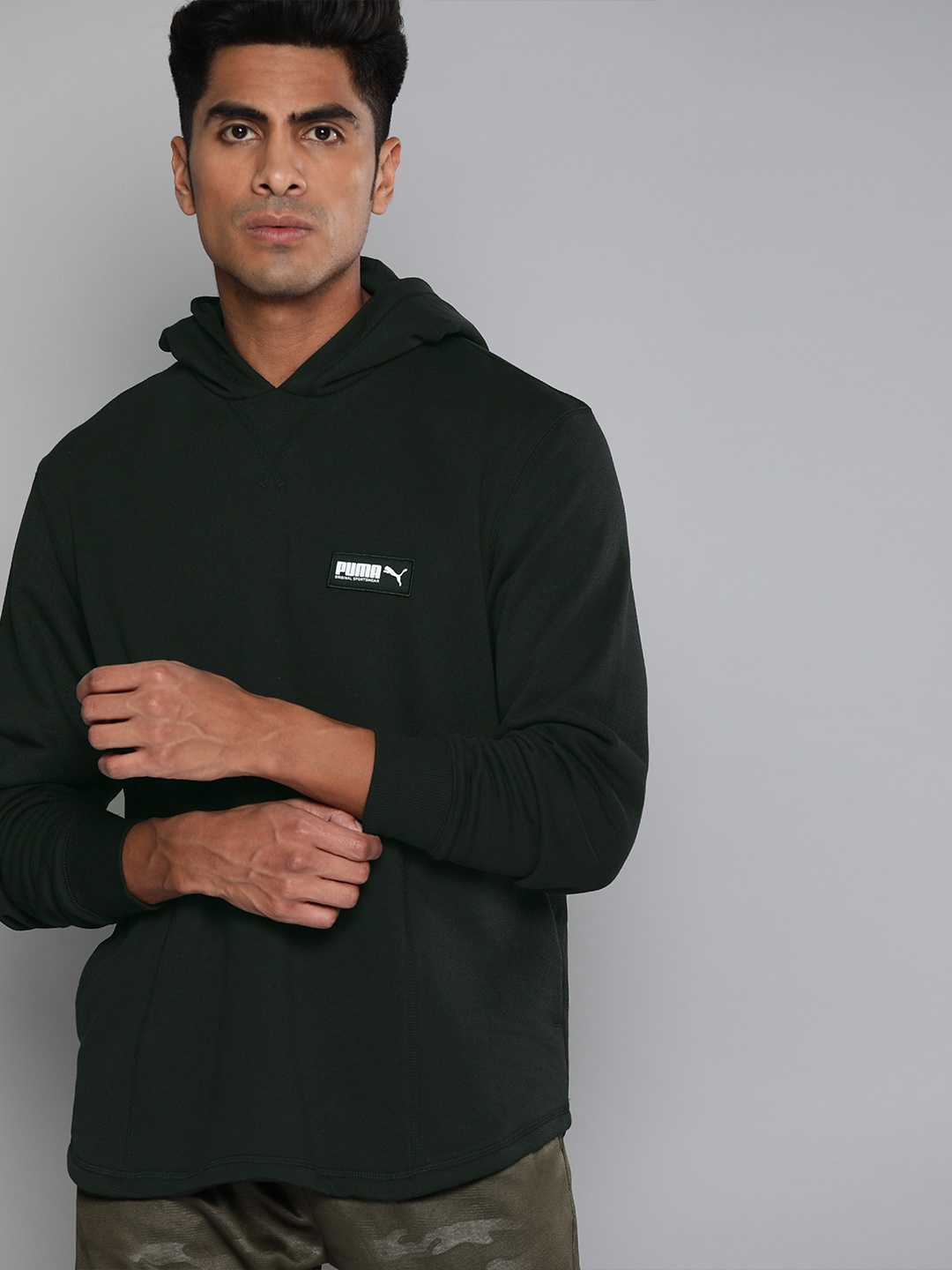

Puma Men Black Self Design Hooded FUSION Pullover Sweatshirt With Applique Detail