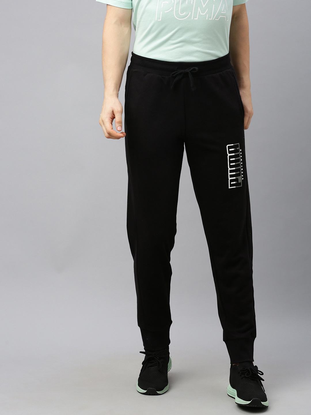 

Puma Men Black Solid Regular Fit ATHLETICS Joggers with Printed Detail