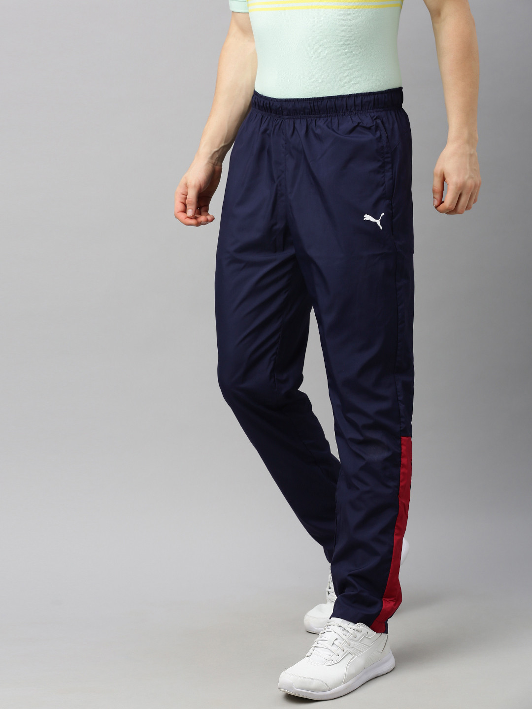 

Puma Men Navy Blue Solid Zippered Woven Track Pants
