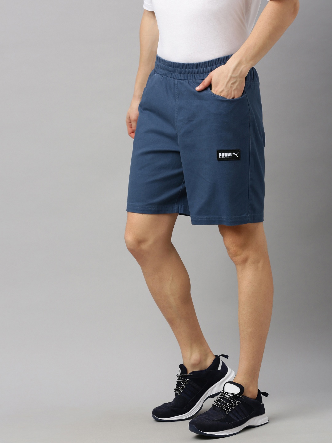 

Puma Men Teal Blue Solid Regular Fit FUSION Sports Shorts