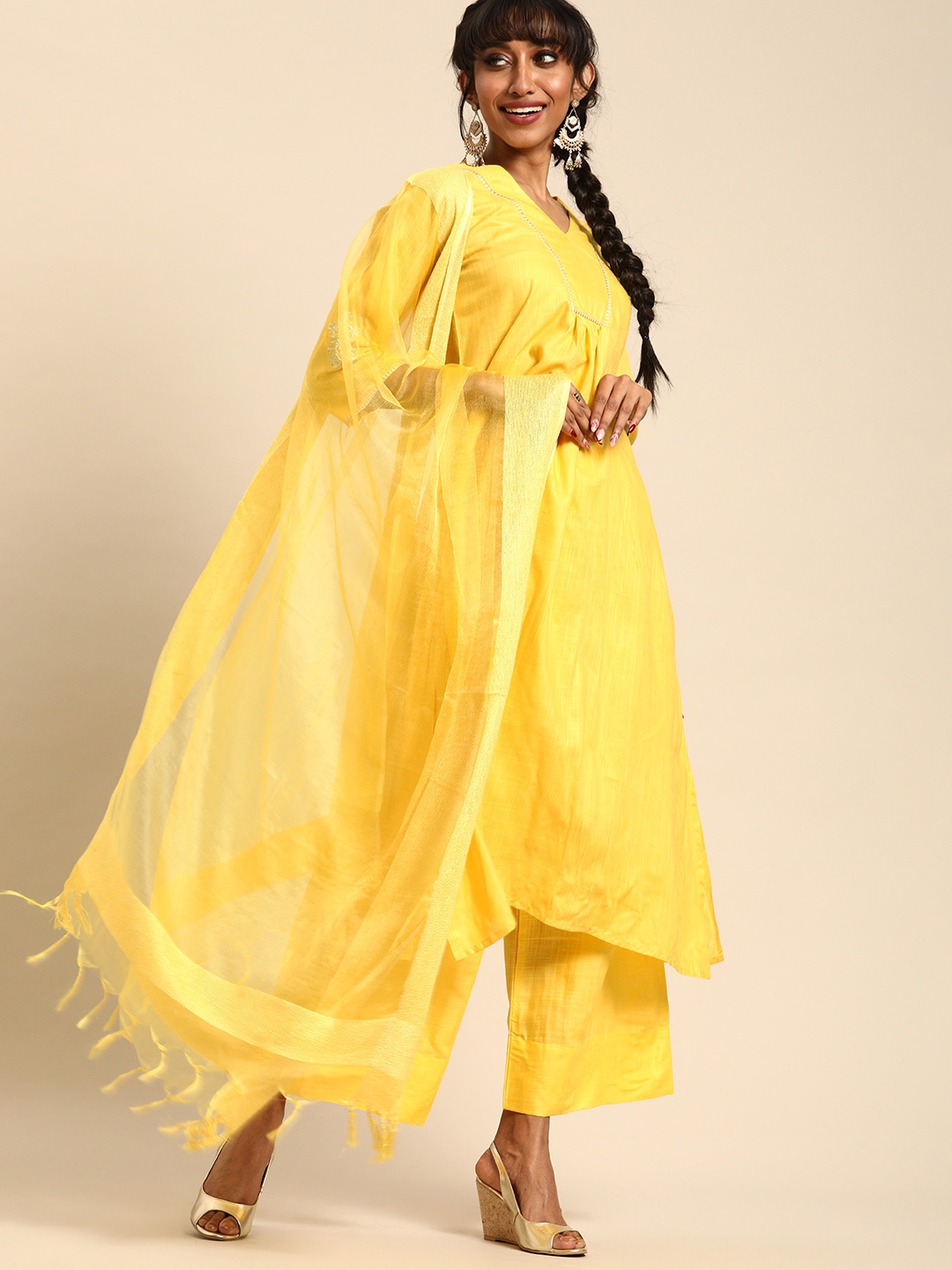 

Varanga Women Yellow Solid Kurta with Palazzos & Dupatta
