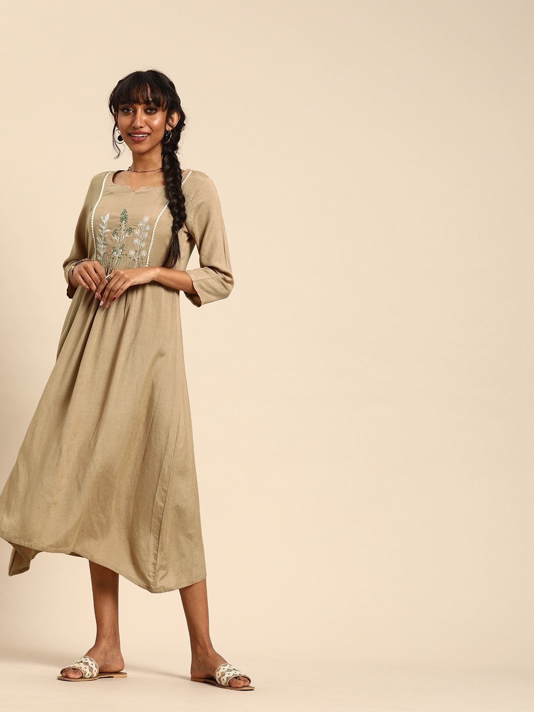 

Varanga Women Beige Solid Fit and Flare Dress with Embroidered Detail