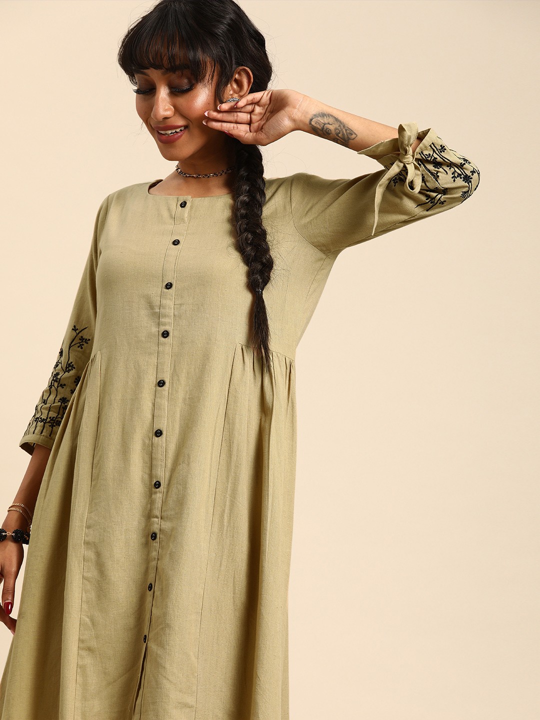 

Varanga Women Beige Solid A-Line Dress with Embroidered Sleeves