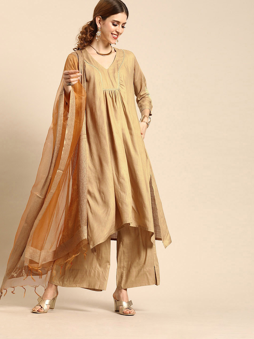 

Varanga Women Beige Solid Kurta with Palazzos & Dupatta