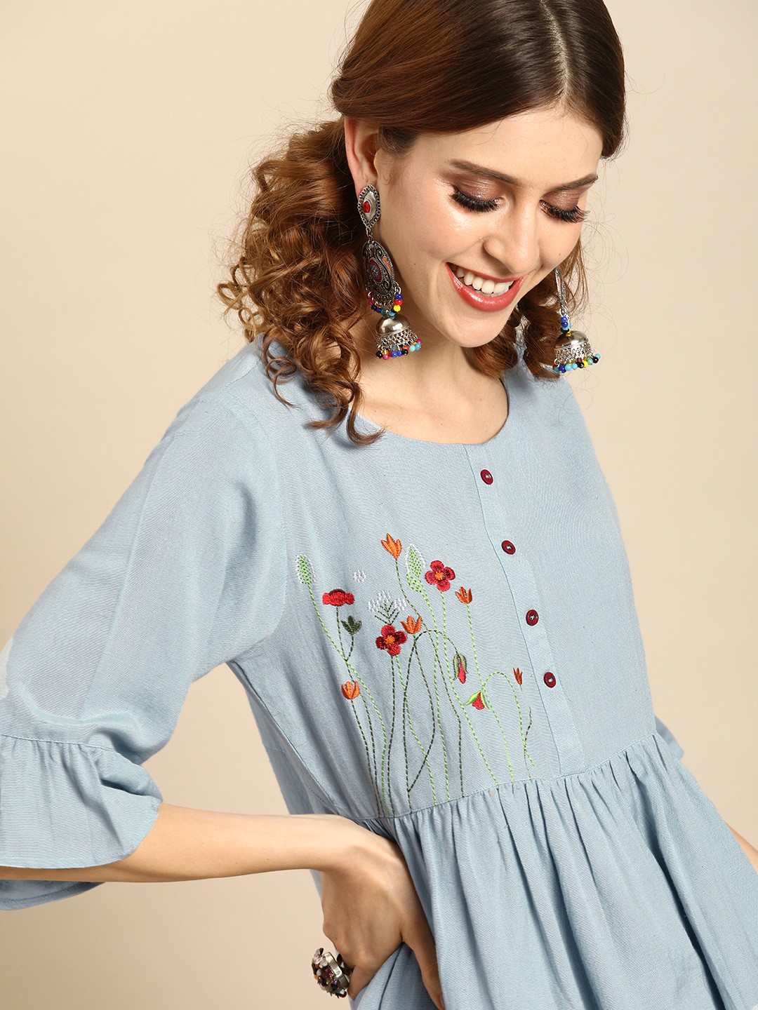 

Varanga Women Blue Solid Longline A-Line Top