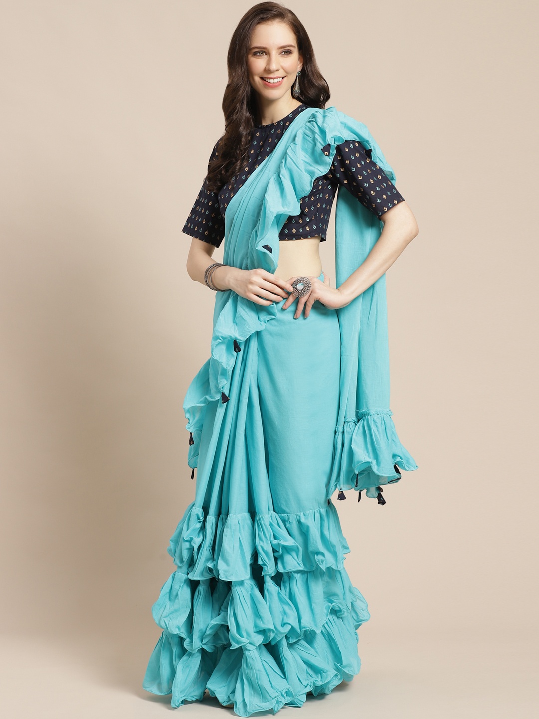 

Nayo Blue Solid Ruffled Saree