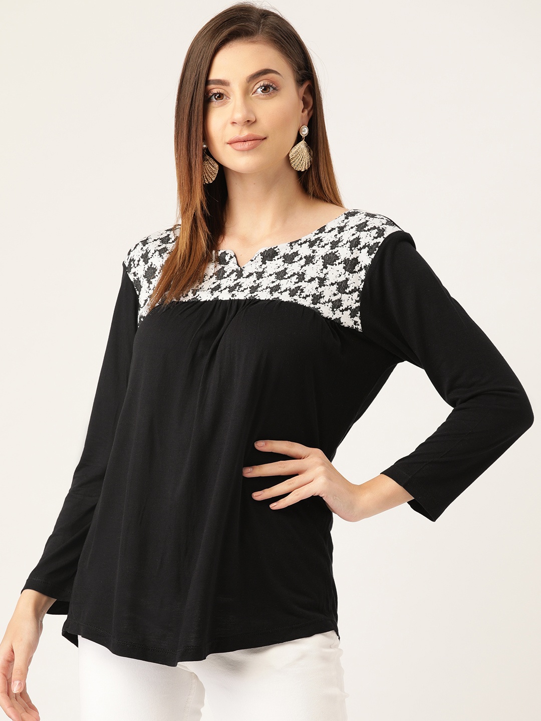 

Rute Women Black & White Solid Regular Top