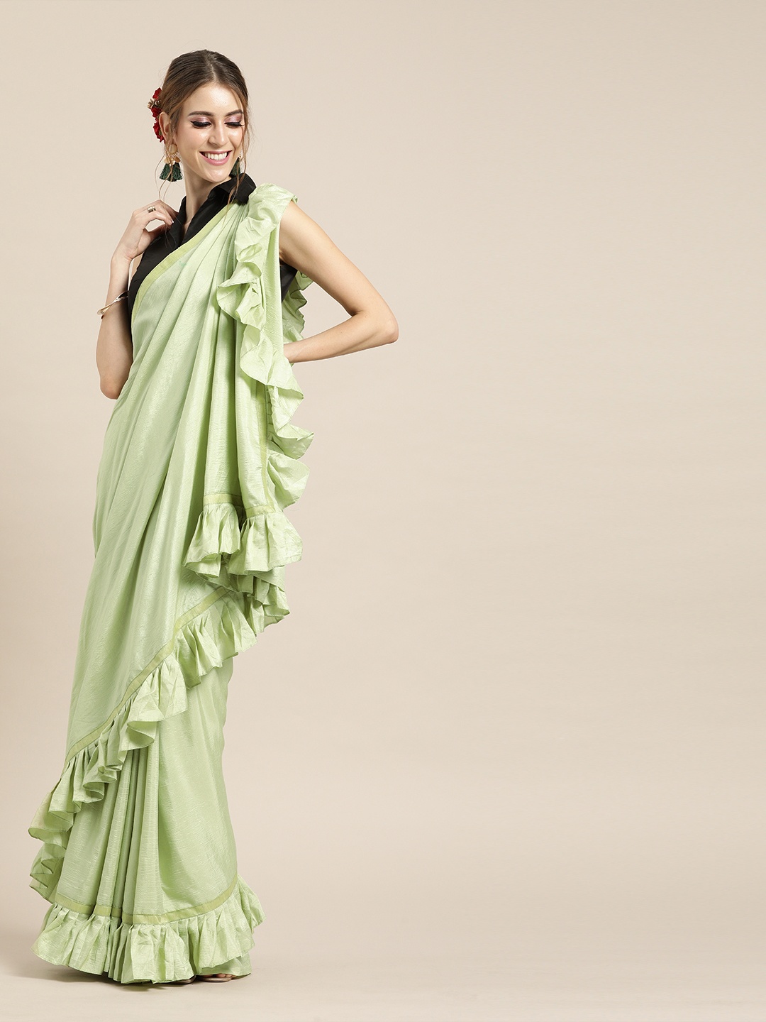 

Mitera Green Solid Silk Blend Saree With Ruffle Detail