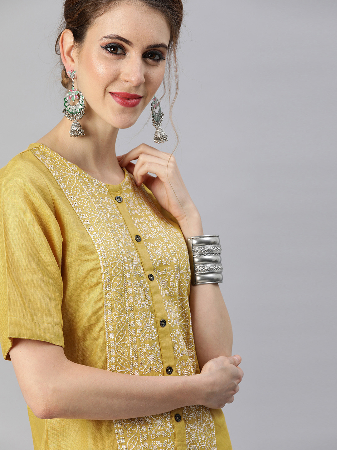 

Indo Era Women Mustard Yellow & Off-White Embroidered Kurta with Palazzos