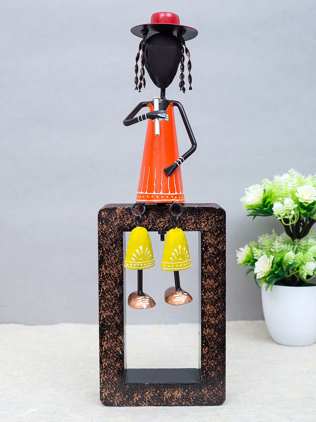 

Golden Peacock Black & Brown Sitting Musician Decorative Showpiece