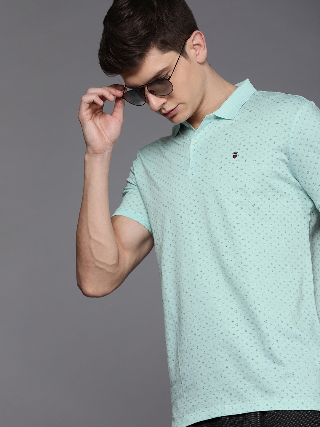 

Louis Philippe Sport Men Turquoise Blue Black Slim Fit Printed Polo Collar Pure Cotton T-shirt