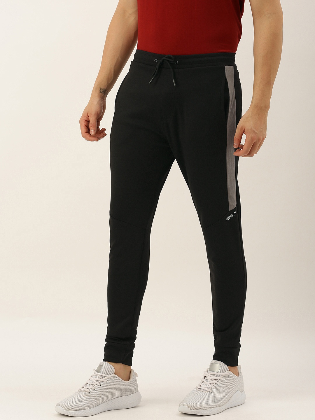 

Proline Active Men Black Slim Fit Solid Joggers with Mesh Panel Detail
