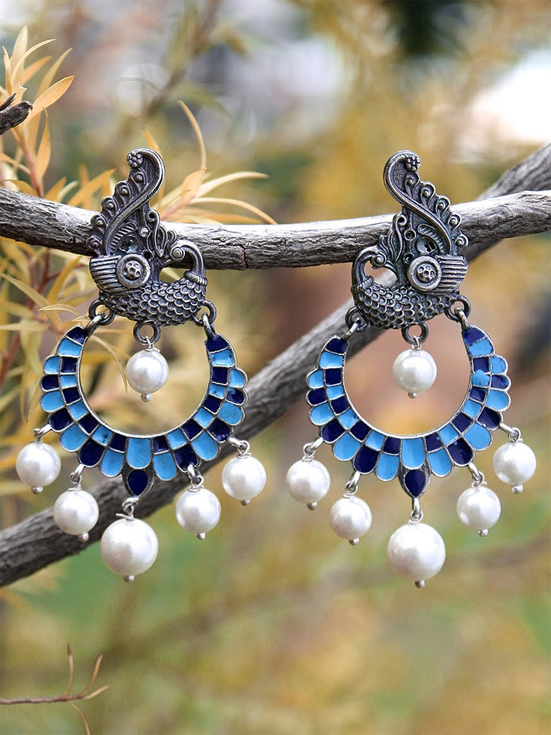 

Adwitiya Collection Silver-Plated & White Peacock Shaped Oxidised Drop Earrings