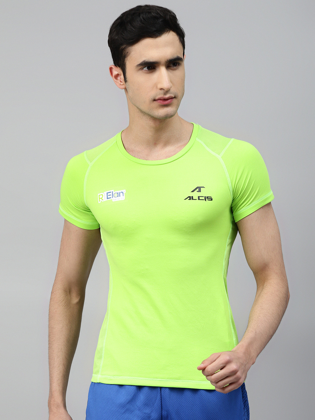 

Alcis Men Fluorescent Green Solid Round Neck T-shirt with Back Printed Detail